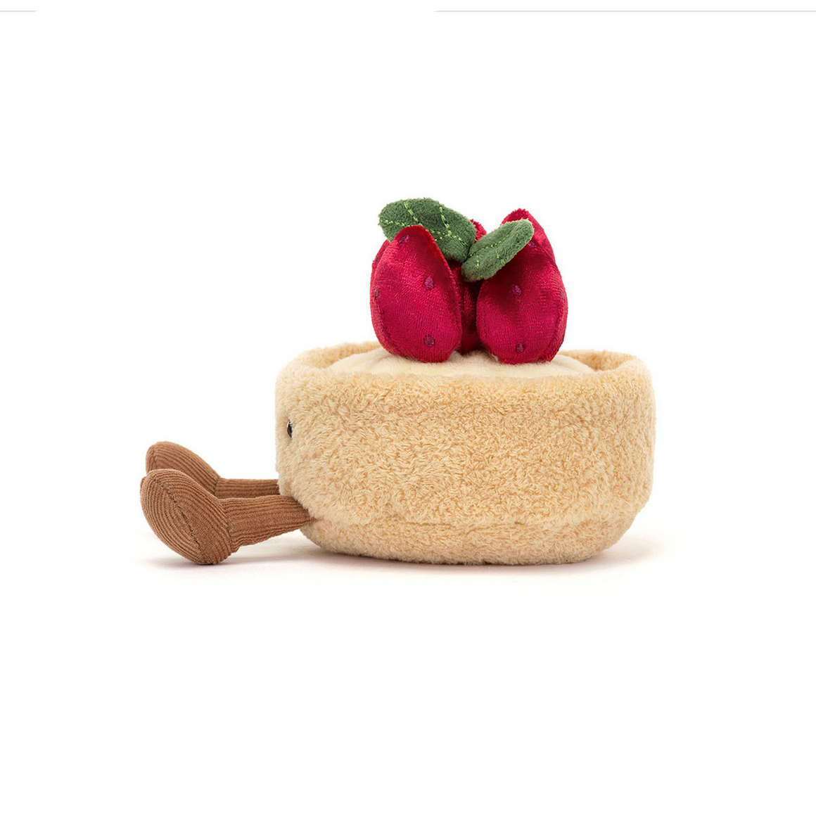Toy resembling a tart with red apples on top on a white background