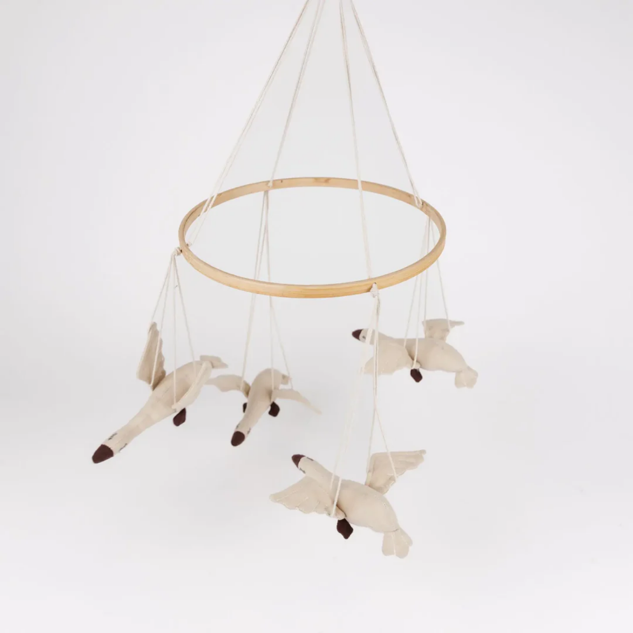 Baby mobile with bird-shaped hanging toys on a white background