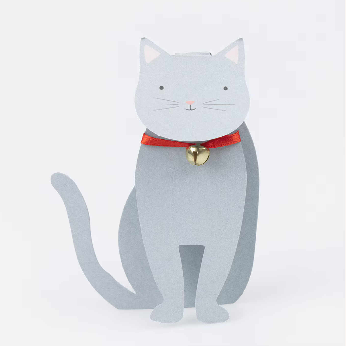 Cat-shaped card with a bell on a white background
