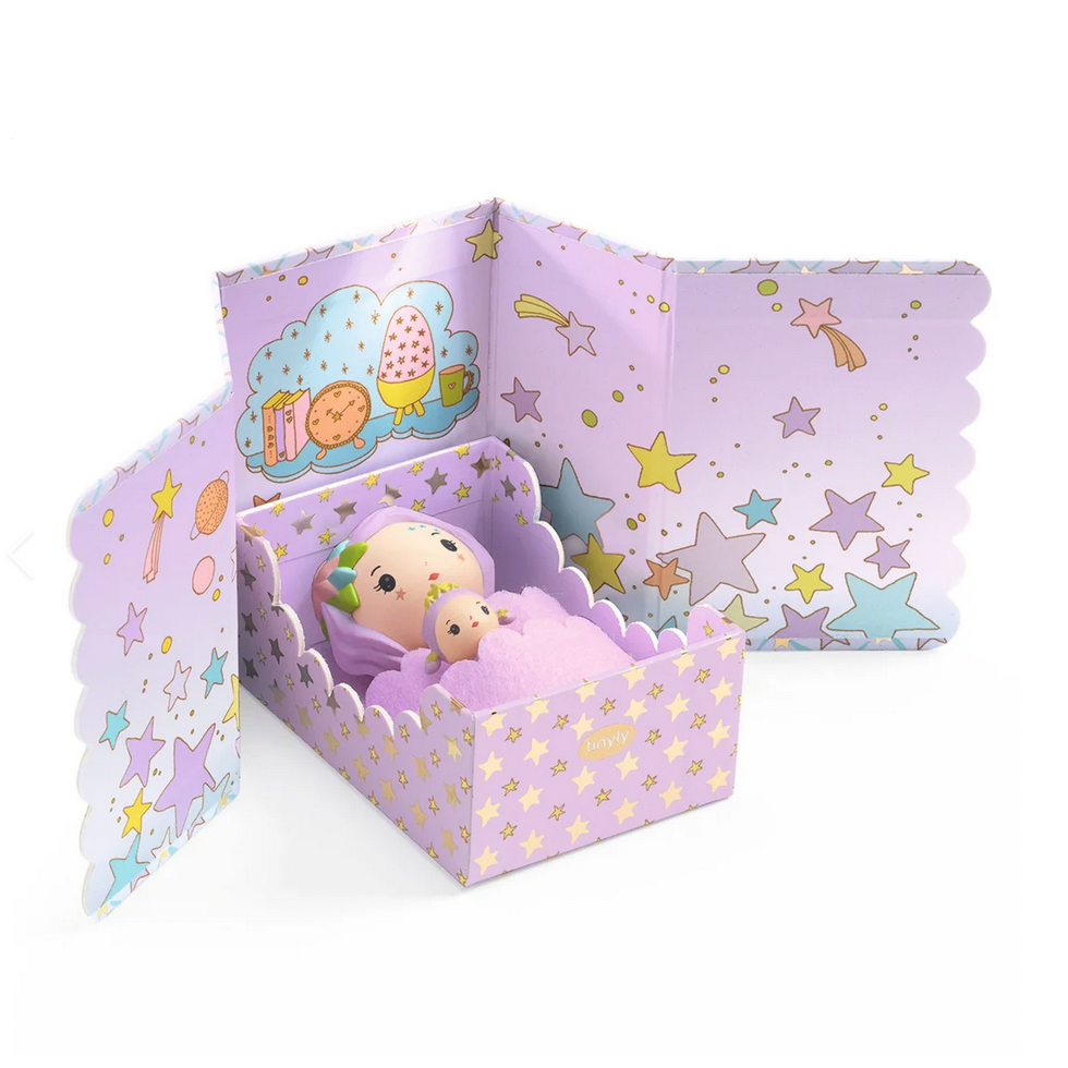 Toy figure in a purple box with star patterns on a white background