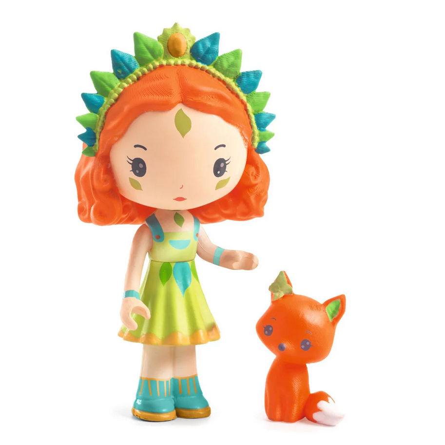 Toy figure with red hair and green headband standing next to a small orange creature on a white background.