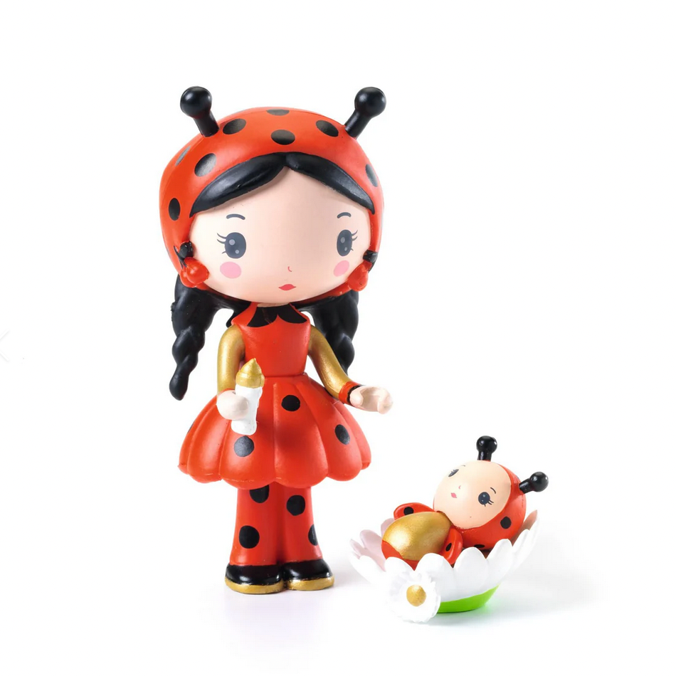 Toy figure of a ladybug character with a baby ladybug, branded as Djeco, on a white background.