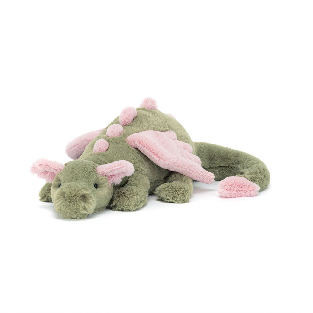 Plush dragon toy with pink accents on a white background