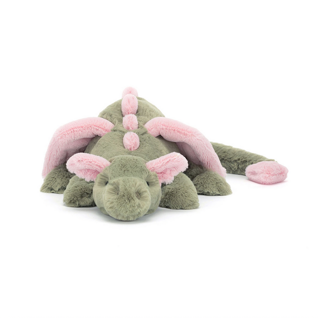 Plush dragon toy with pink accents on a white background