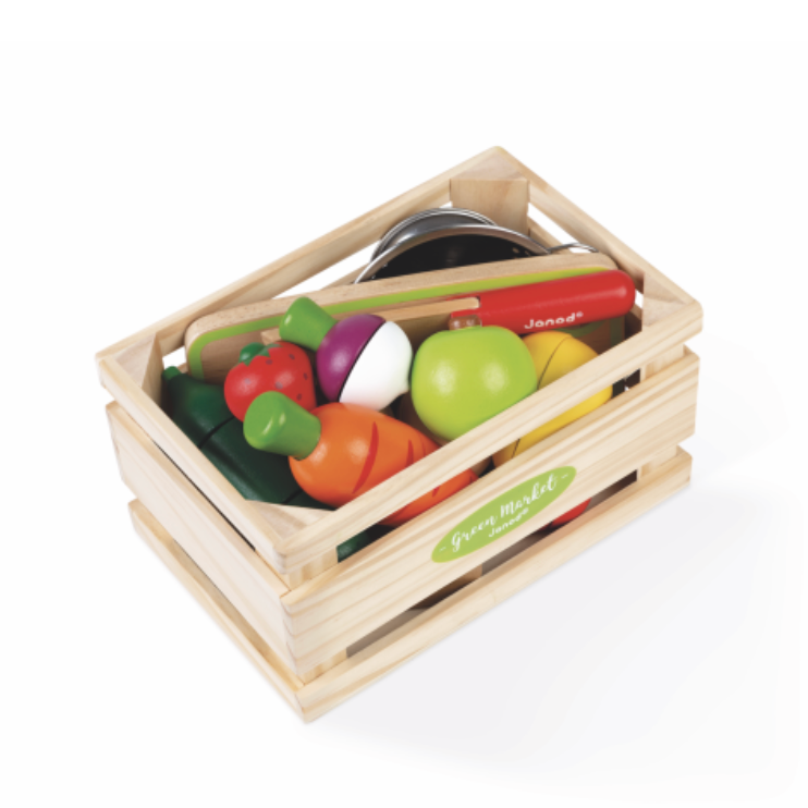 Wooden toy crate with colorful toy fruits, vegetables, and utensils on a white background