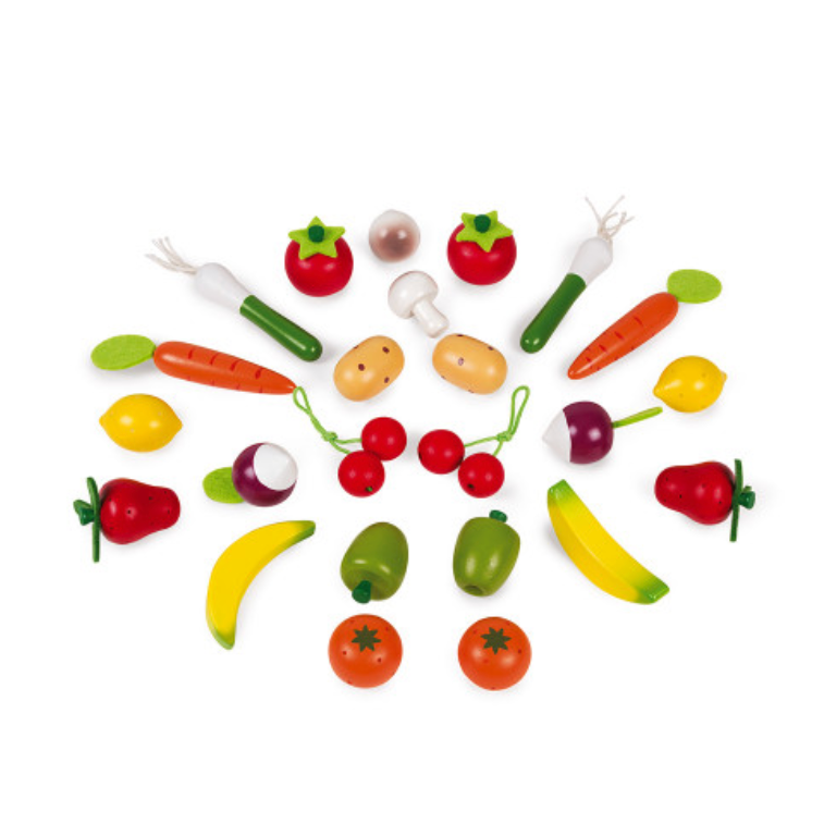 Colorful toy vegetables and fruits on a white background
