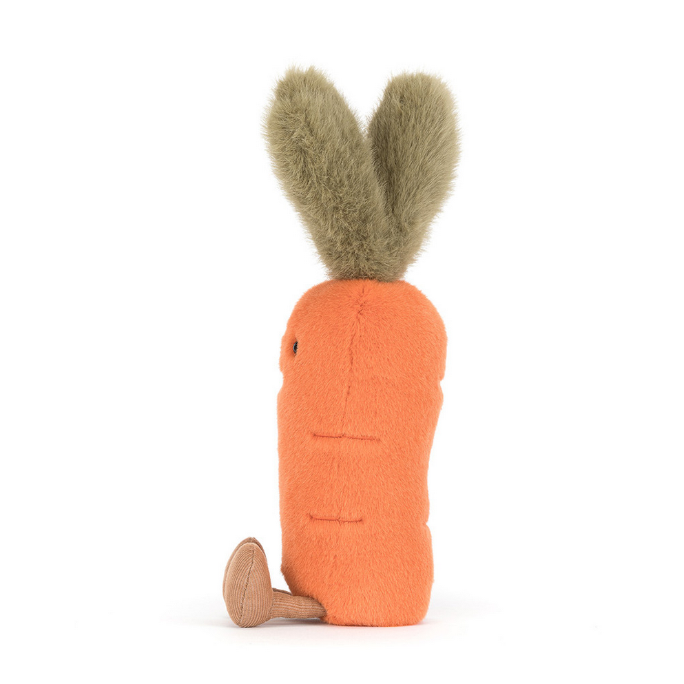 Carrot-shaped plush toy with a heart-shaped top on a white background