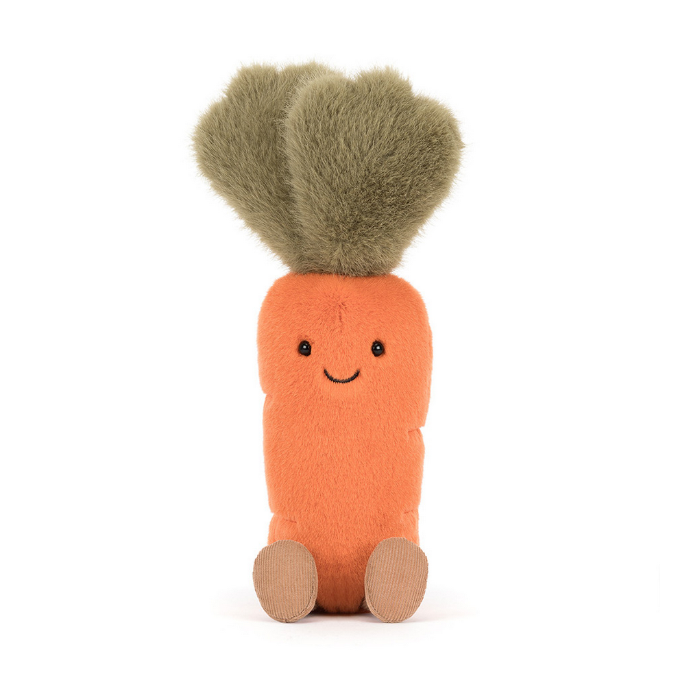 Plush toy carrot with a smiling face on a white background