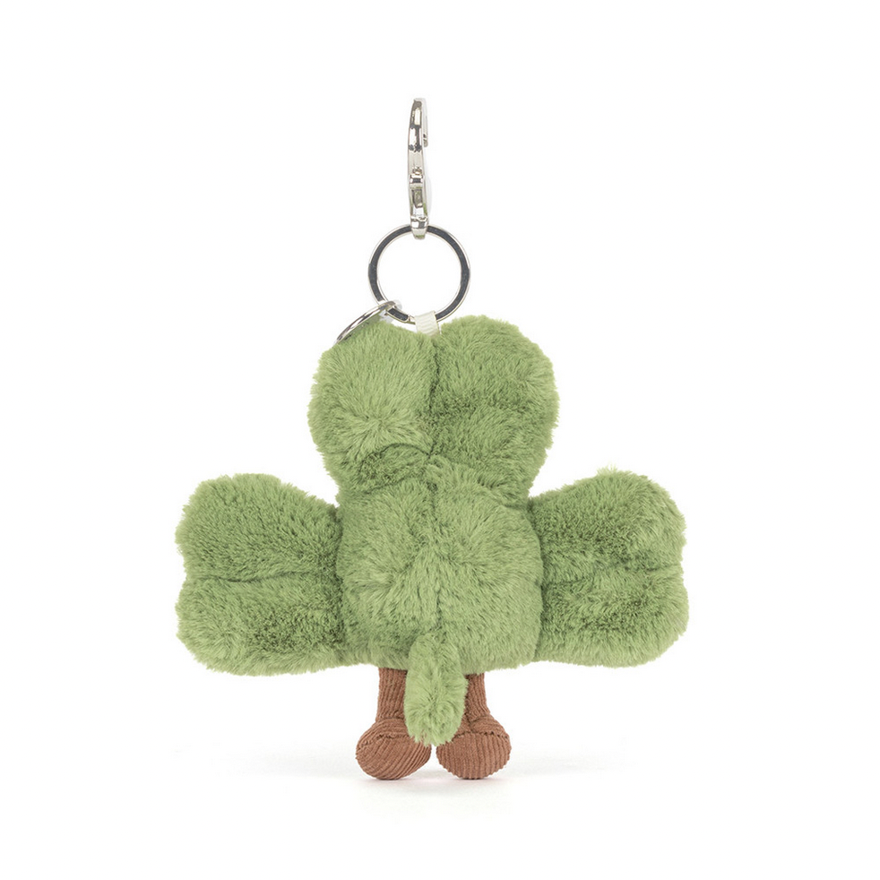 Green plush shamrock keychain on a white background