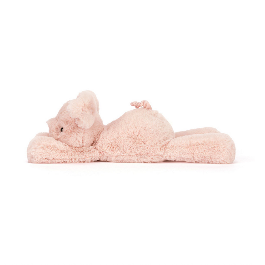 Pink plush toy resembling a pig on a white background