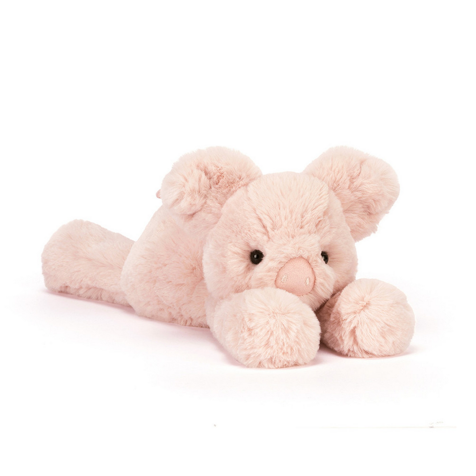 Plush pig toy on a white background