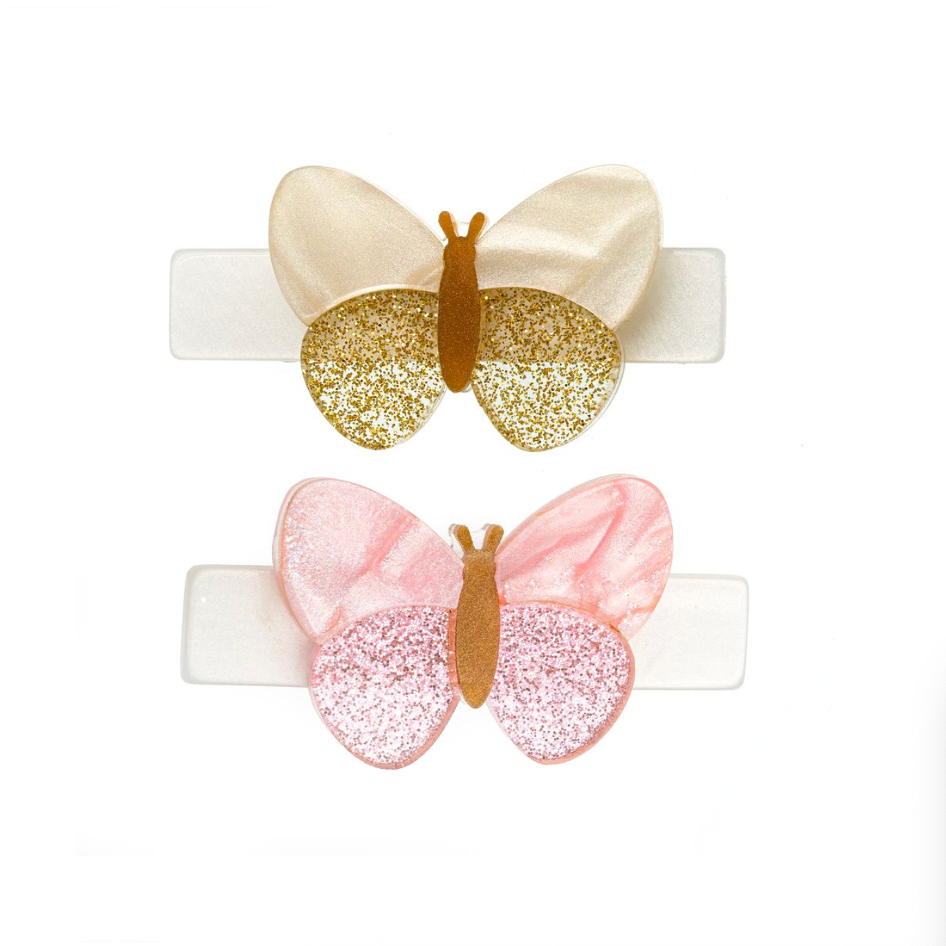 Butterfly-shaped hair clips in gold and pink on a white background