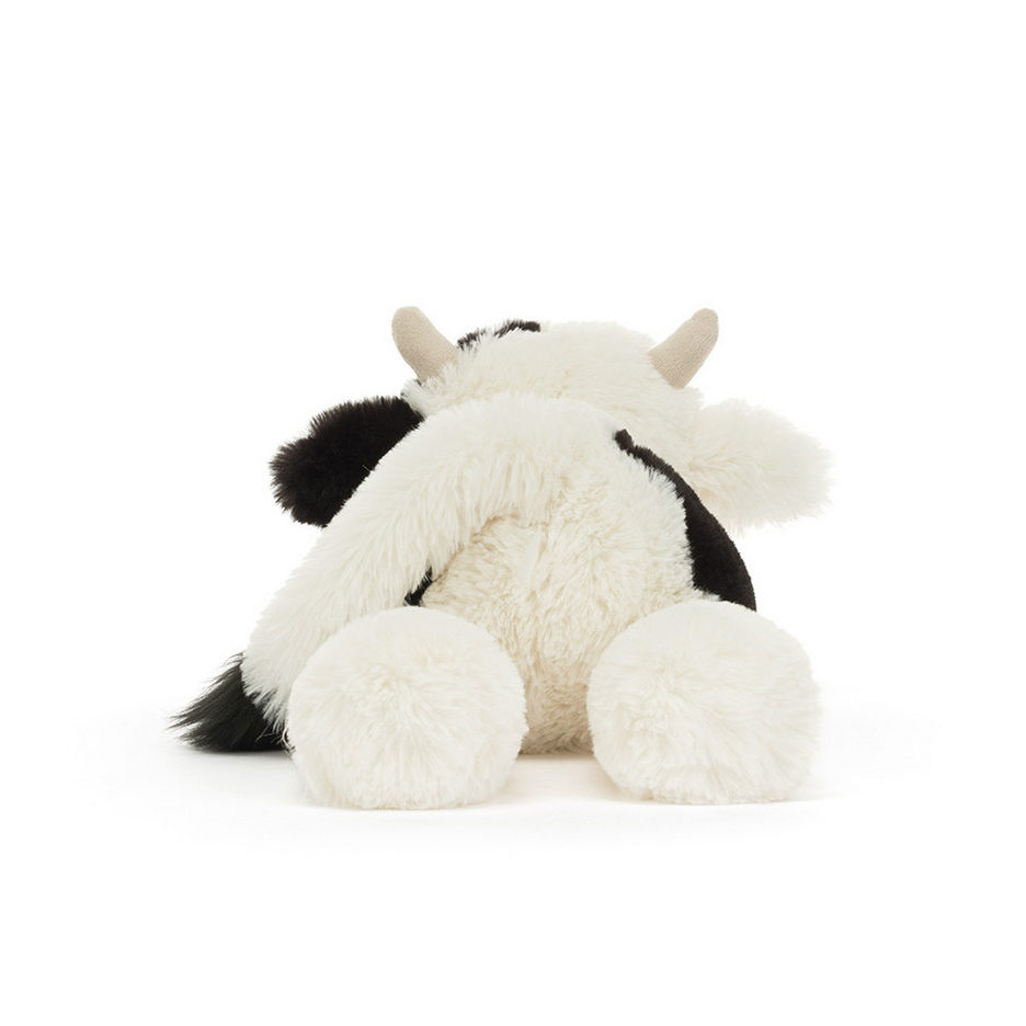 Stuffed animal cow toy labeled 'Smudge Cow' on a white background