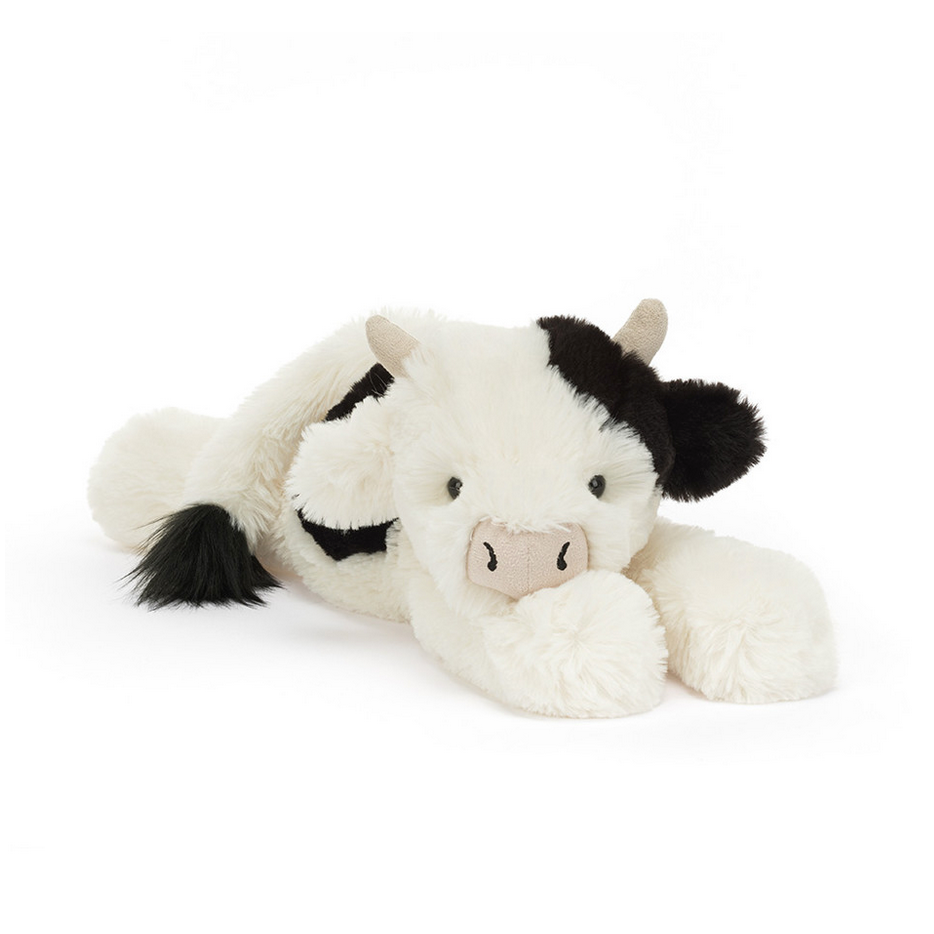 Plush cow toy labeled 'Smudge Cow' on a white background