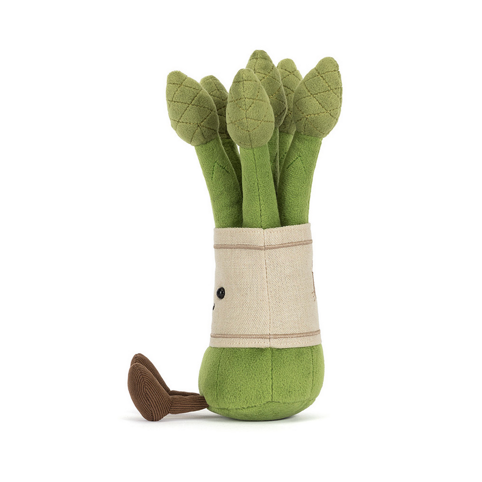 Plush toy shaped like asparagus on a white background