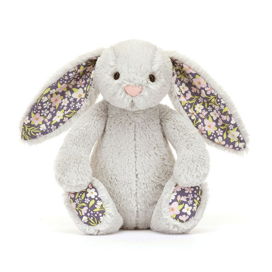 Floral-patterned gray bunny toy on a white background