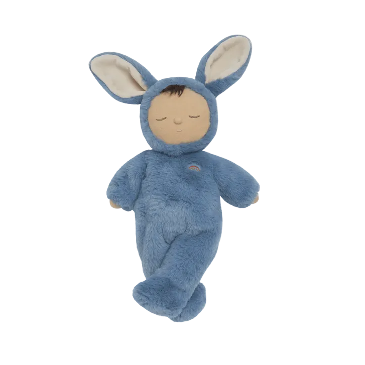 Blue plush toy with bunny ears on a beige background