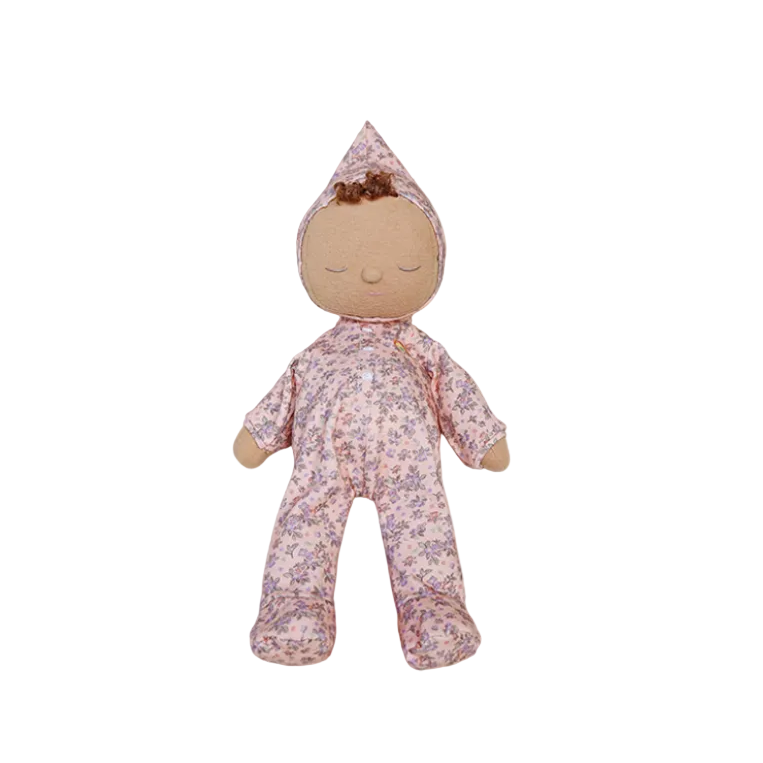 Stuffed doll with floral outfit on a white background