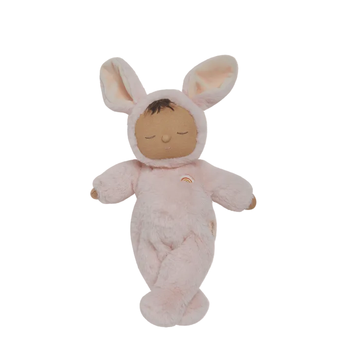 Plush toy baby doll in a bunny costume on a white background