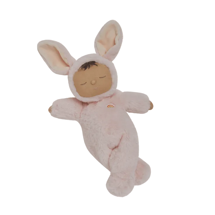 Baby doll in a bunny costume on a white background