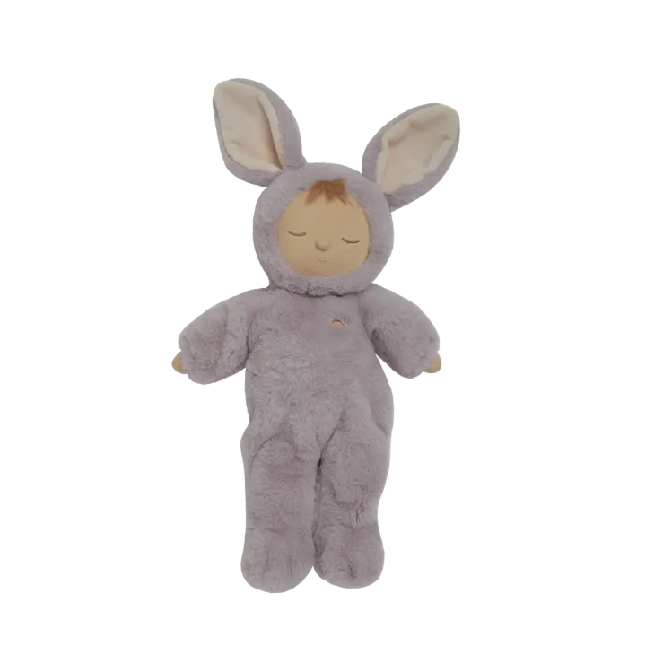 Plush toy in a gray bunny costume on a light beige background