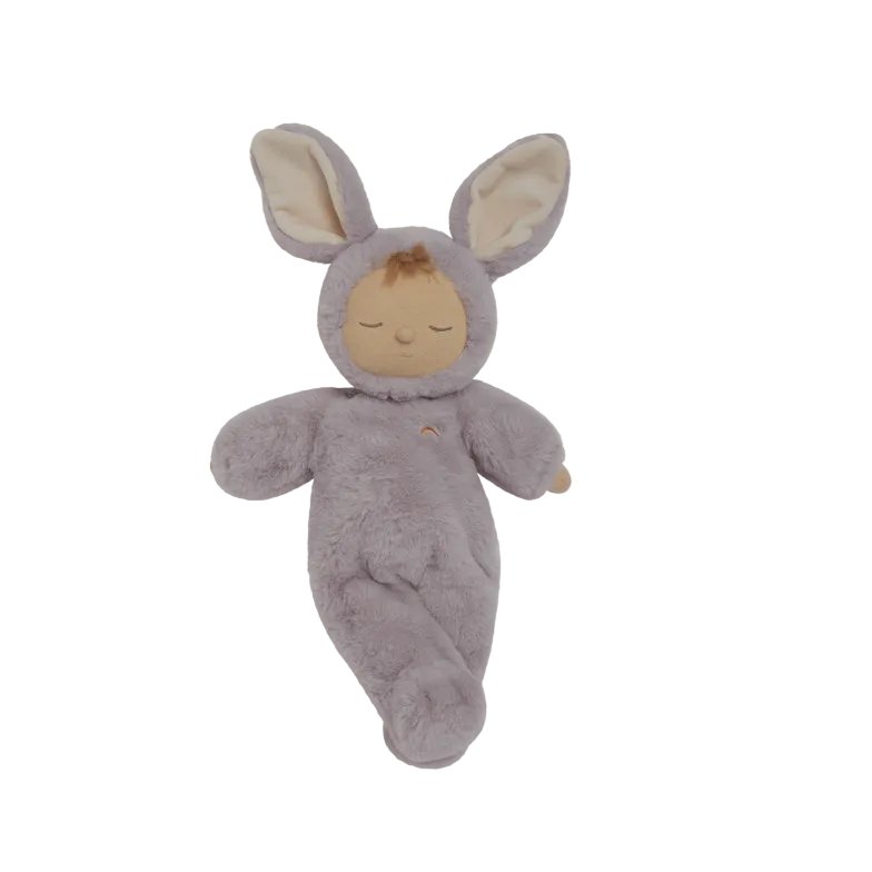 Plush toy in a gray bunny costume on a beige background