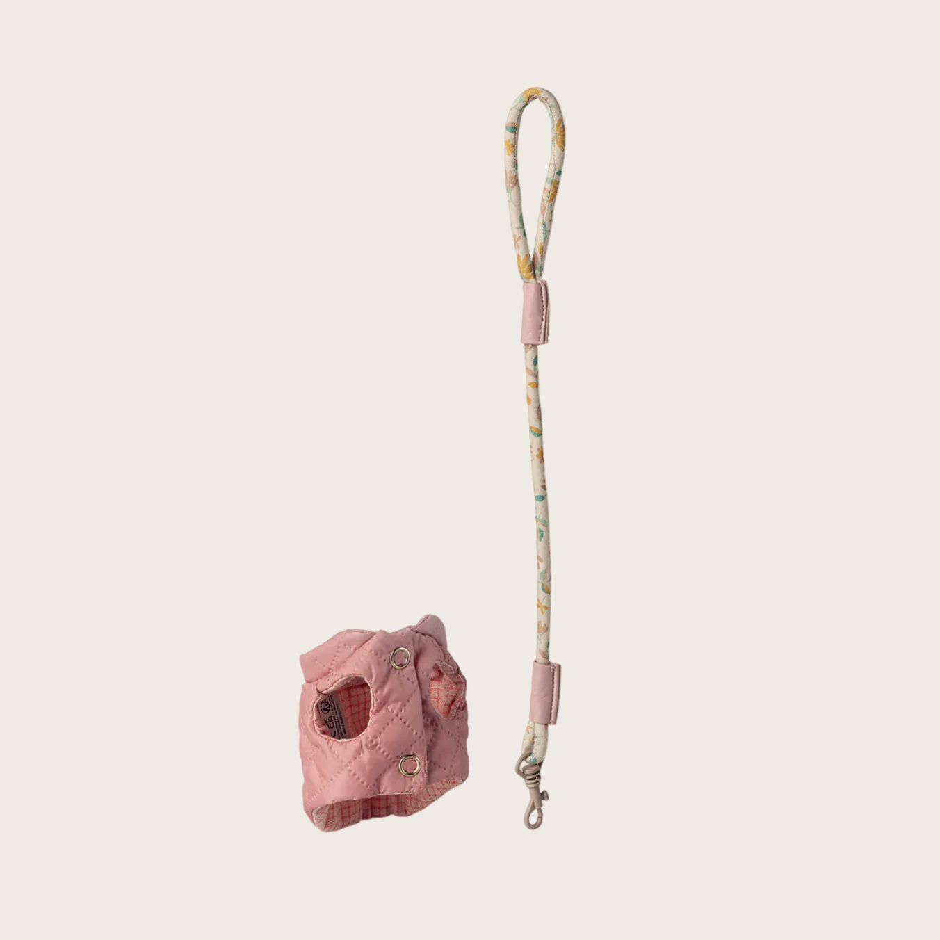 pet toy's Pink leash and jacket on a white background