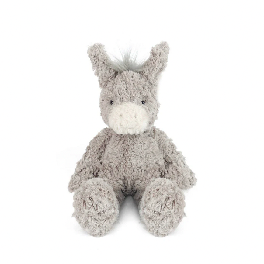Plush donkey toy on a white background
