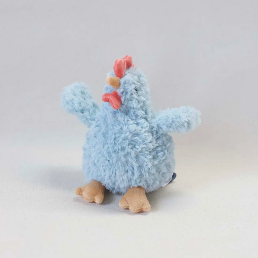 Blue plush toy chicken on a light gray background