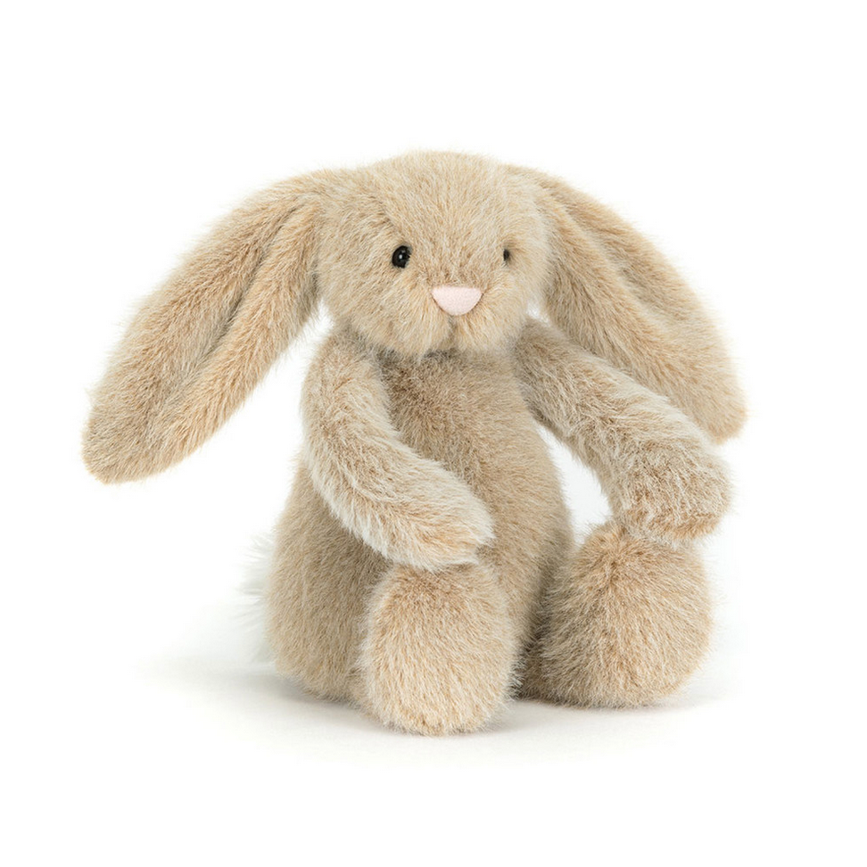 Plush bunny toy on a white background