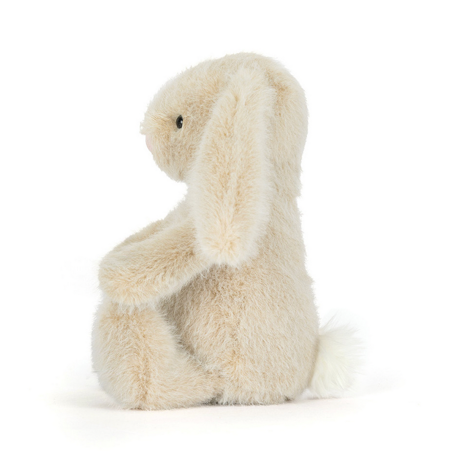 Stuffed animal toy resembling a bird on a white background