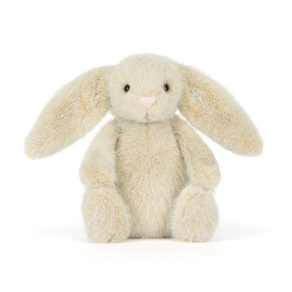 Plush bunny toy on a white background