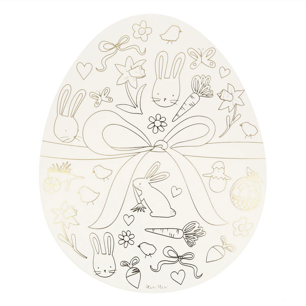 Decorative Easter egg with bunny, carrot, and bow design on a white background