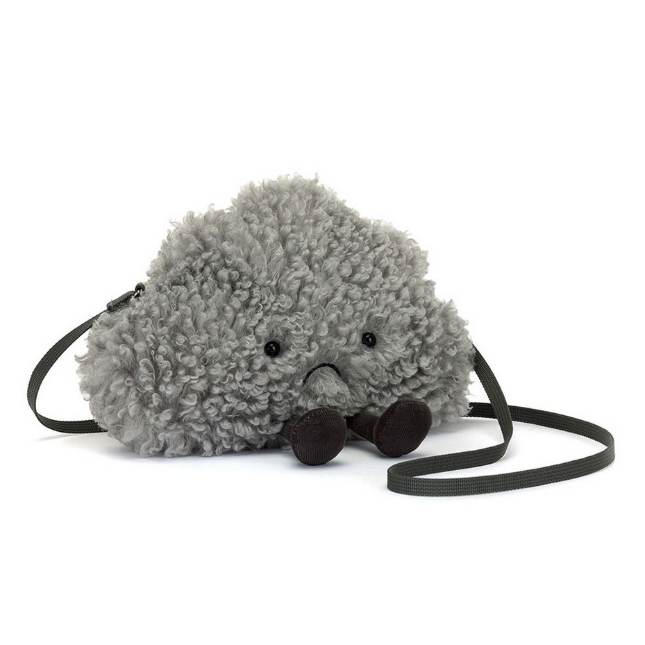 Gray plush toy with a bow tie on a white background