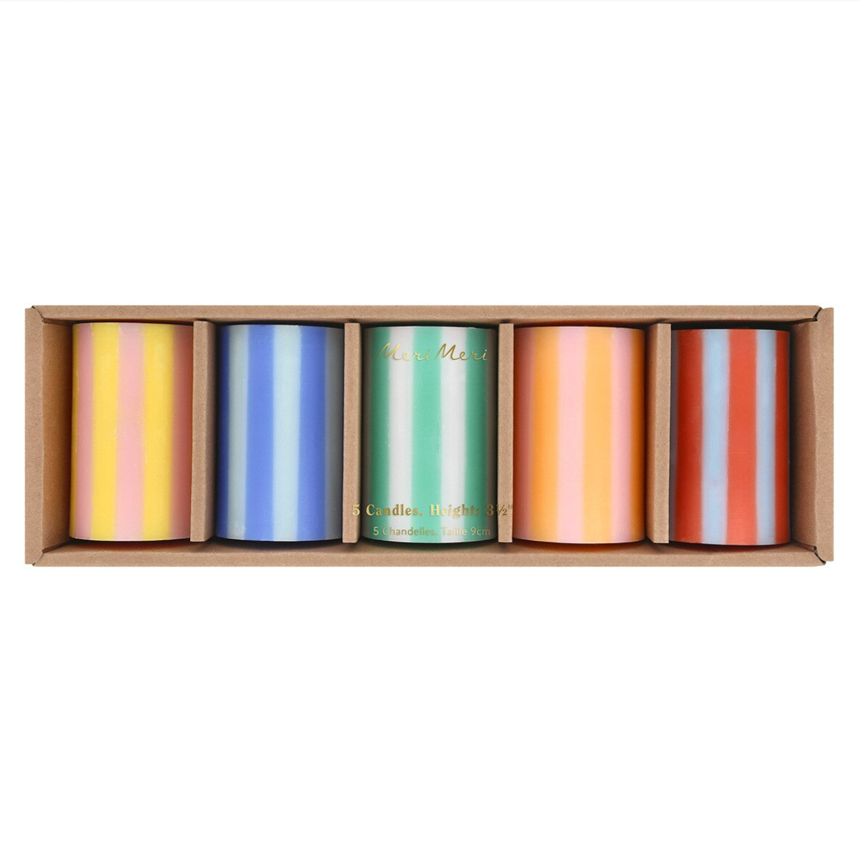 Set of five colorful candles in a wooden box on a white background