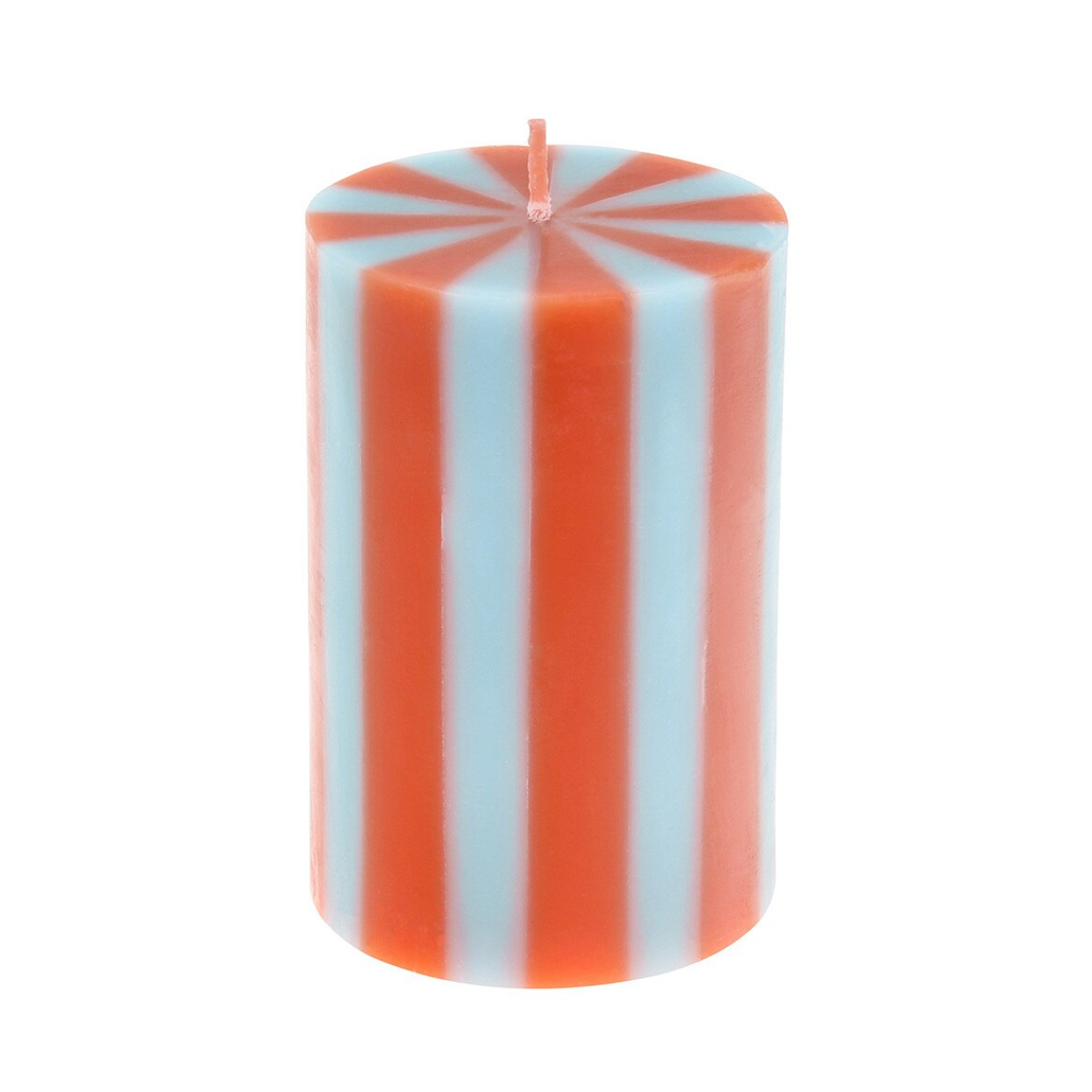 Cylindrical candle with orange and white vertical stripes on a white background