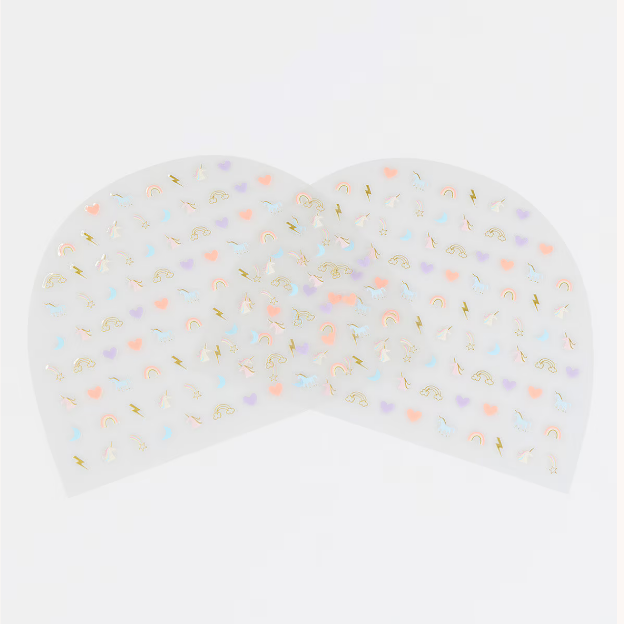 Two clear nail sticker mats with colorful specks on a white background