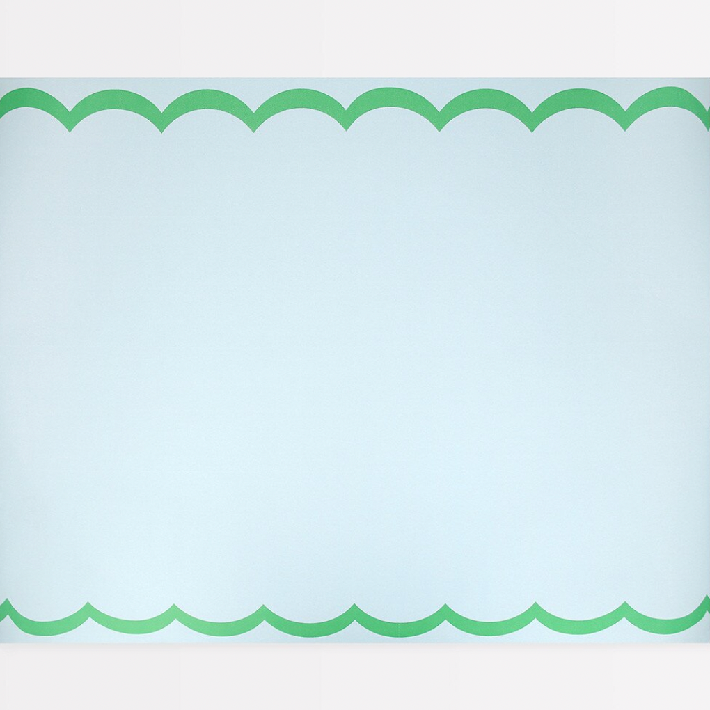 Scallop-edged light blue card with green scalloped border on a white background