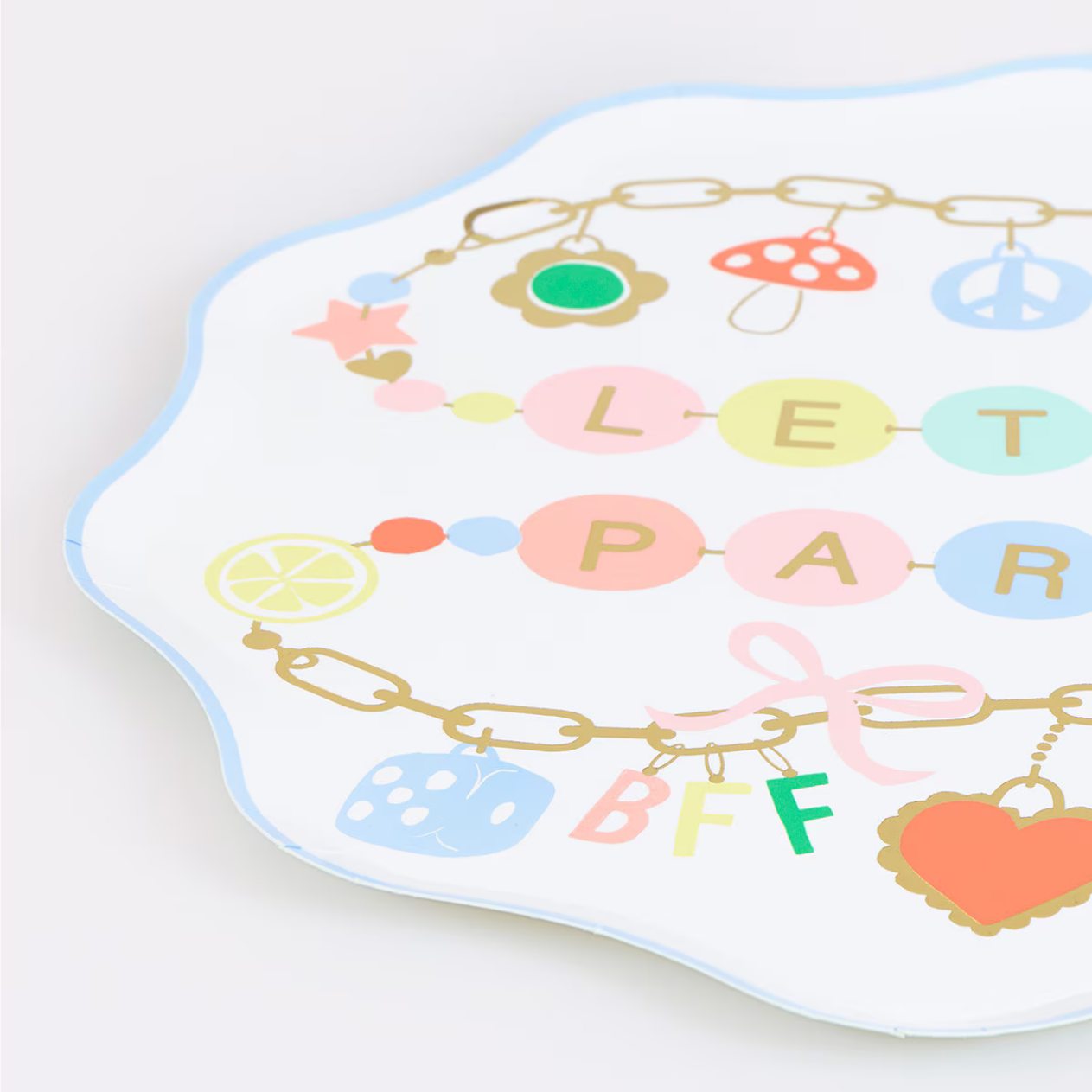 Decorative plate with colorful letters and symbols on a white background
