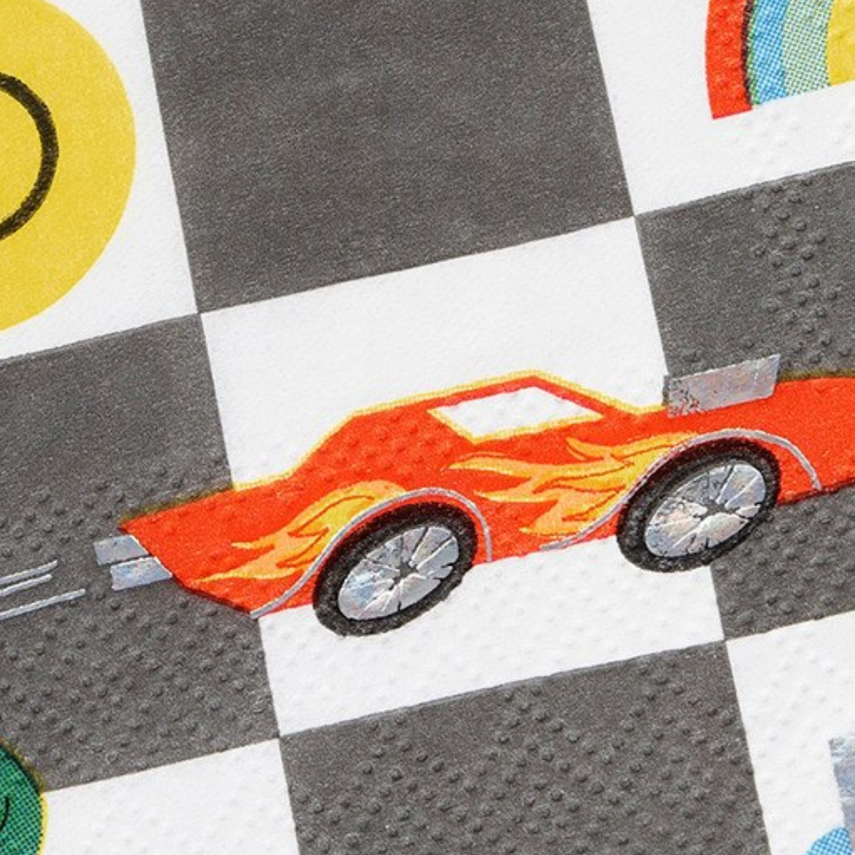 Children's play mat with a red car on a checkered background