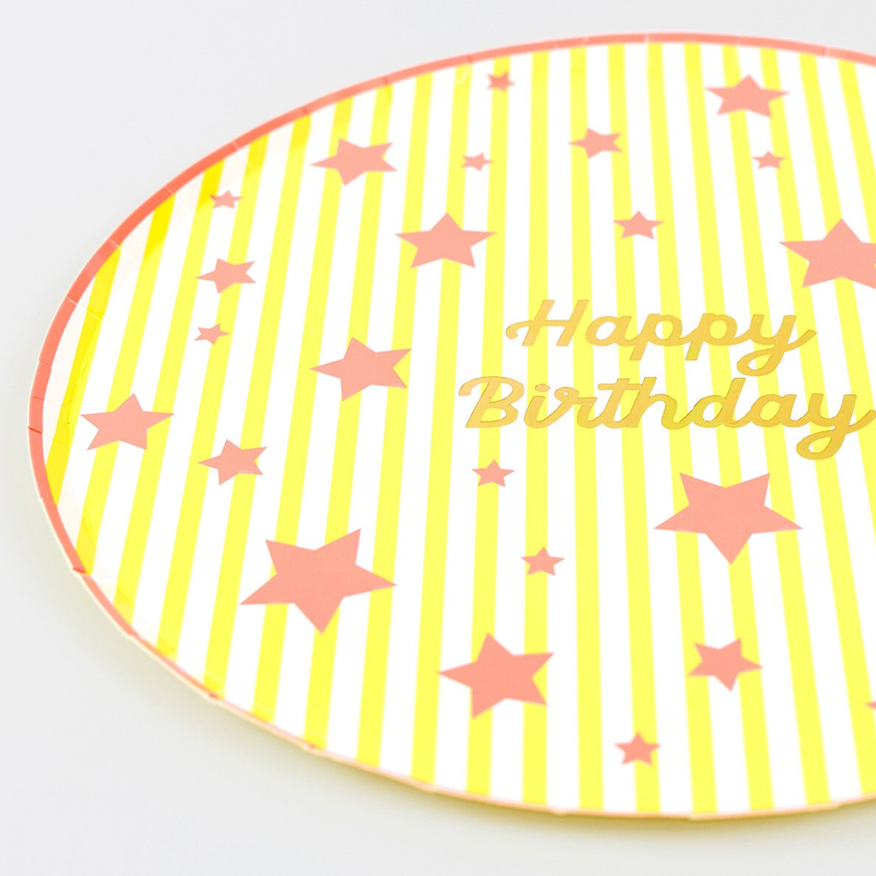 Happy Birthday card with pink stars and yellow stripes on a white background