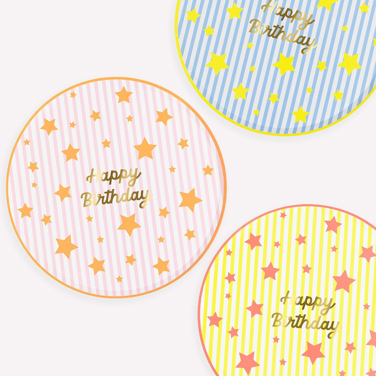 Four round cards with 'Happy Birthday' text and star patterns on a white background