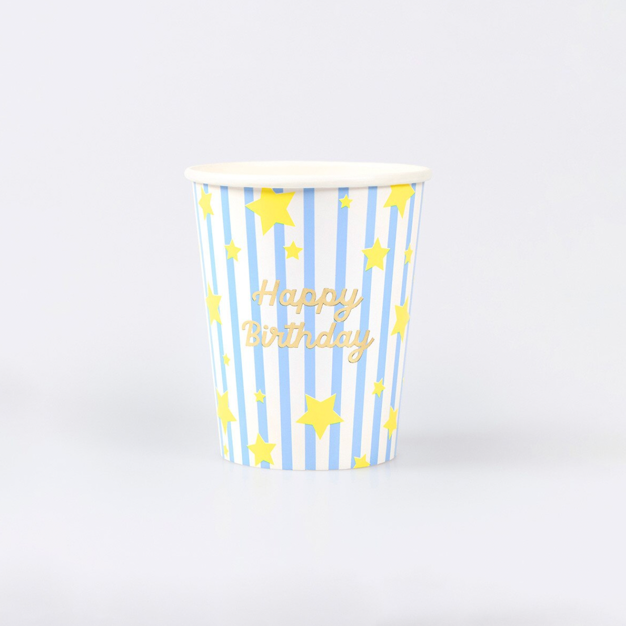 Paper cup with blue stripes, yellow stars, and 'Happy Birthday' text on a white background