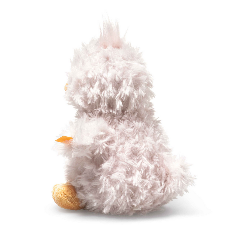 Plush toy chick on a white background