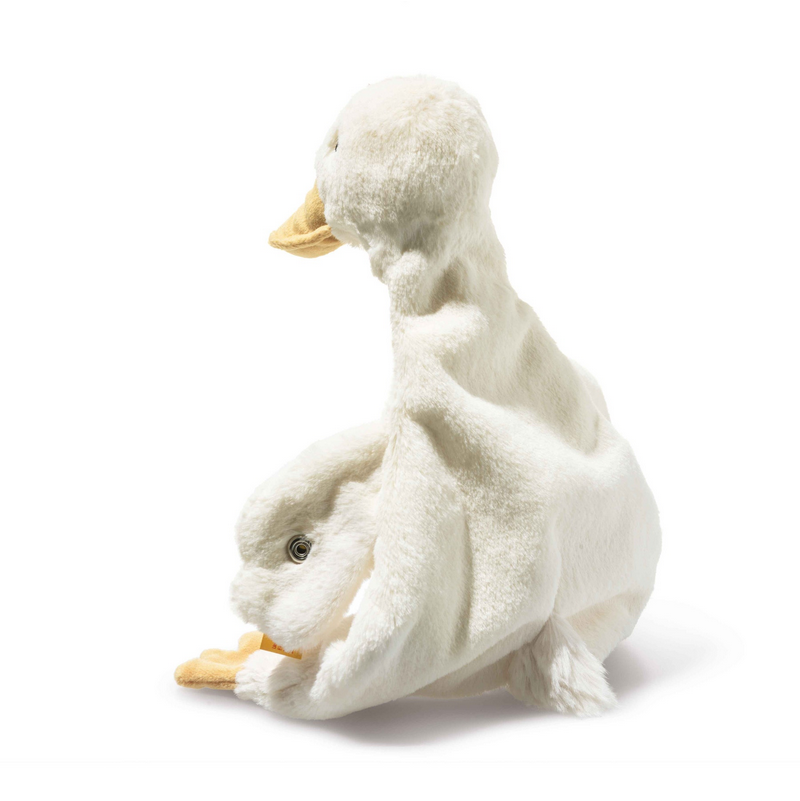 Two white plush ducks sitting on top of each other on a white background
