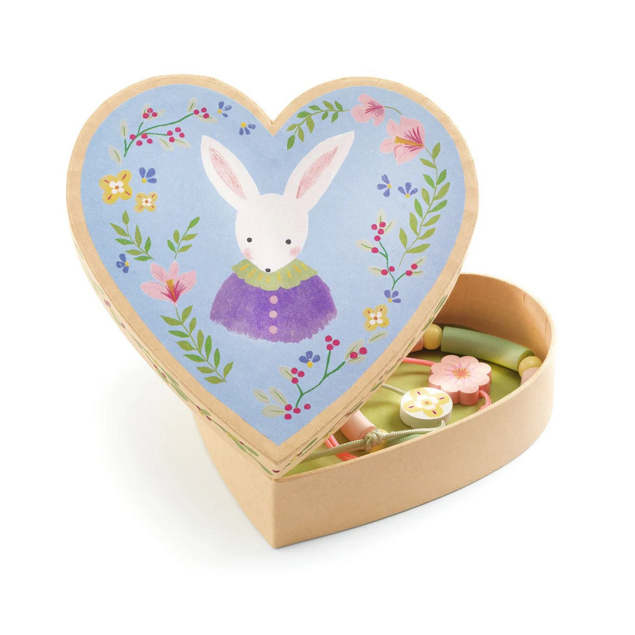 Heart-shaped box with a rabbit illustration on a white background