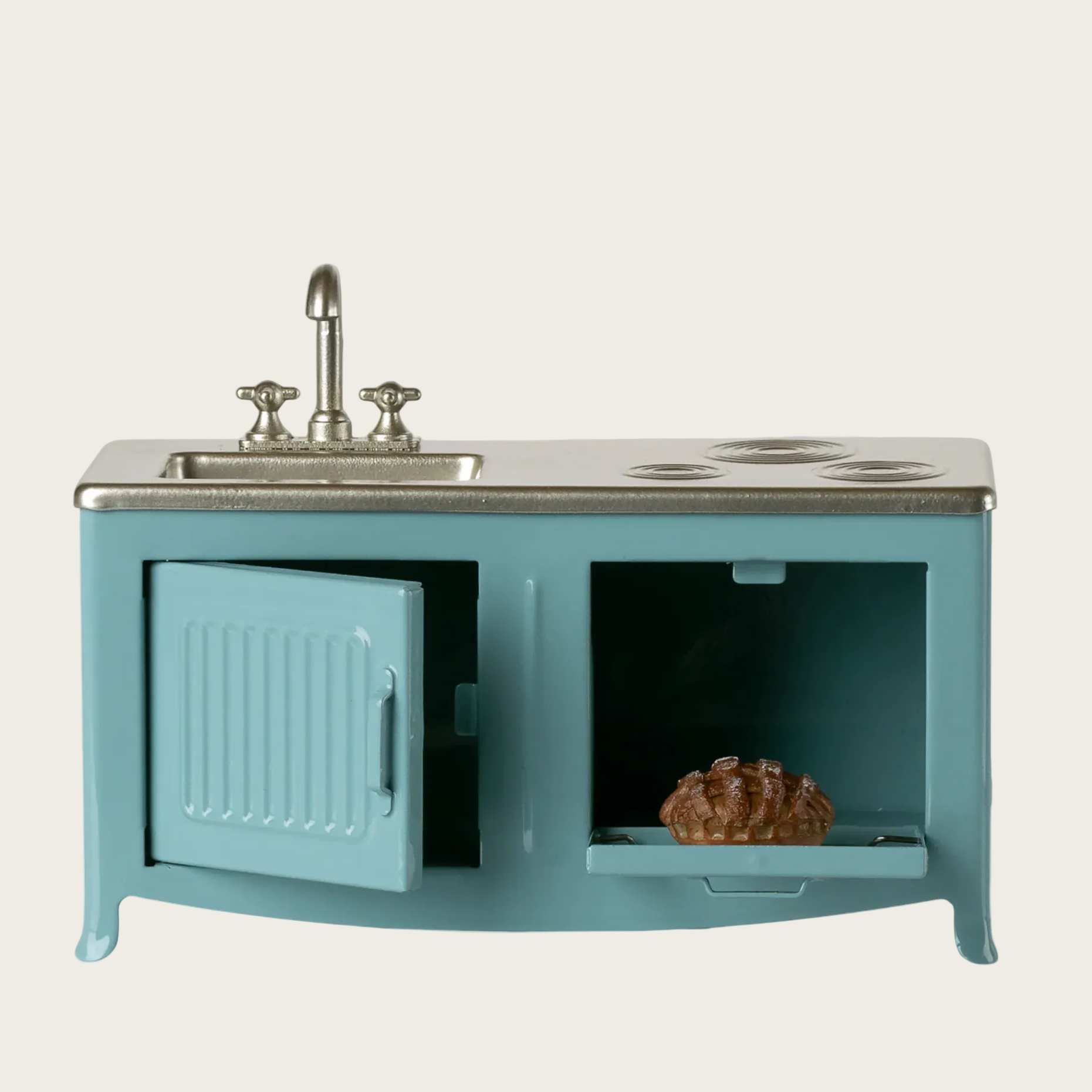Teal kitchen sink unit with a stove top on a computer screen