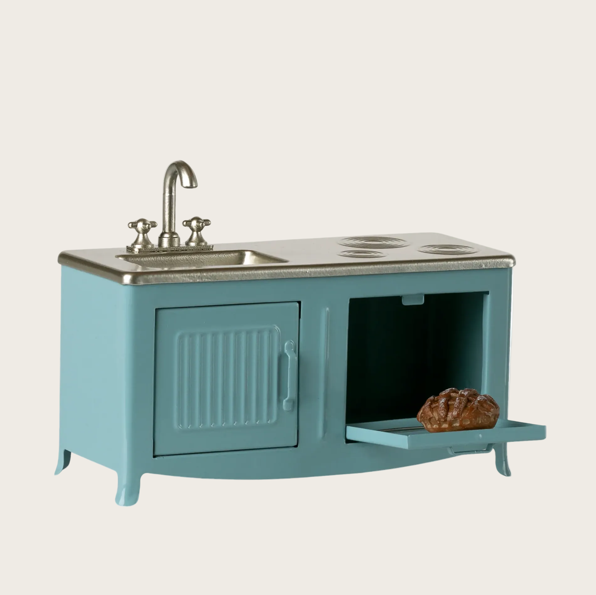 Teal children's play kitchen with sink and stove top 