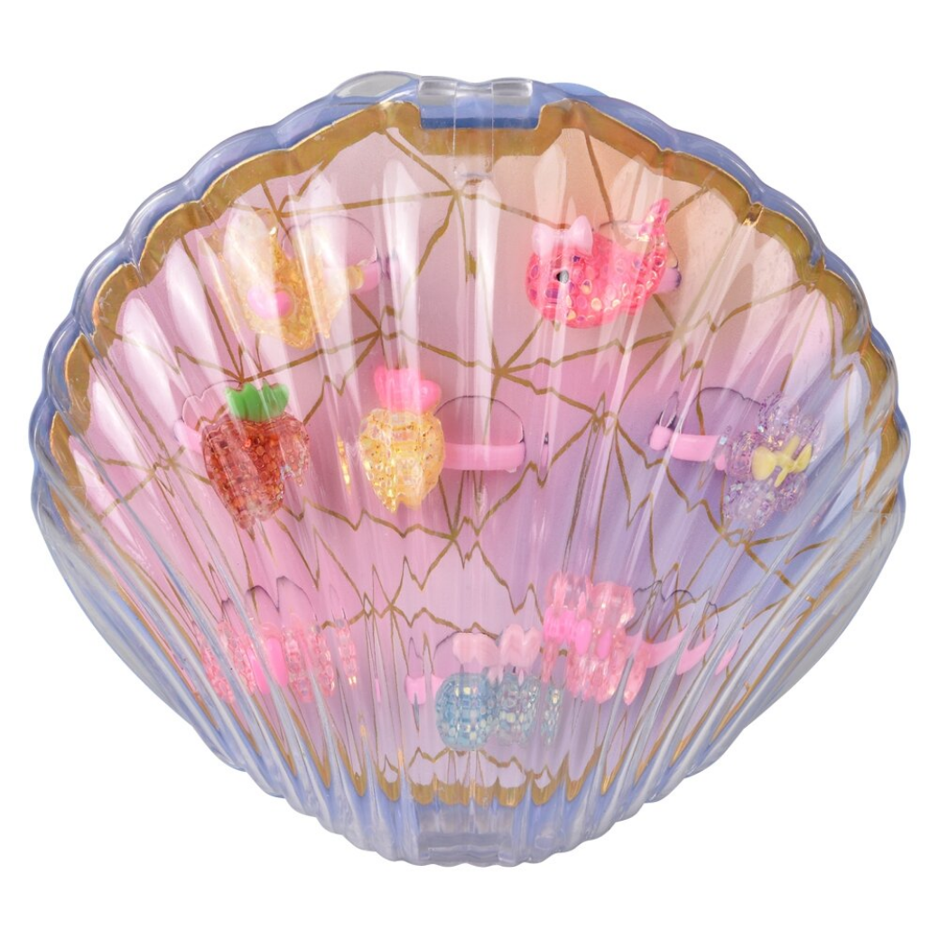 Decorative shell with colorful seashells inside on a white background