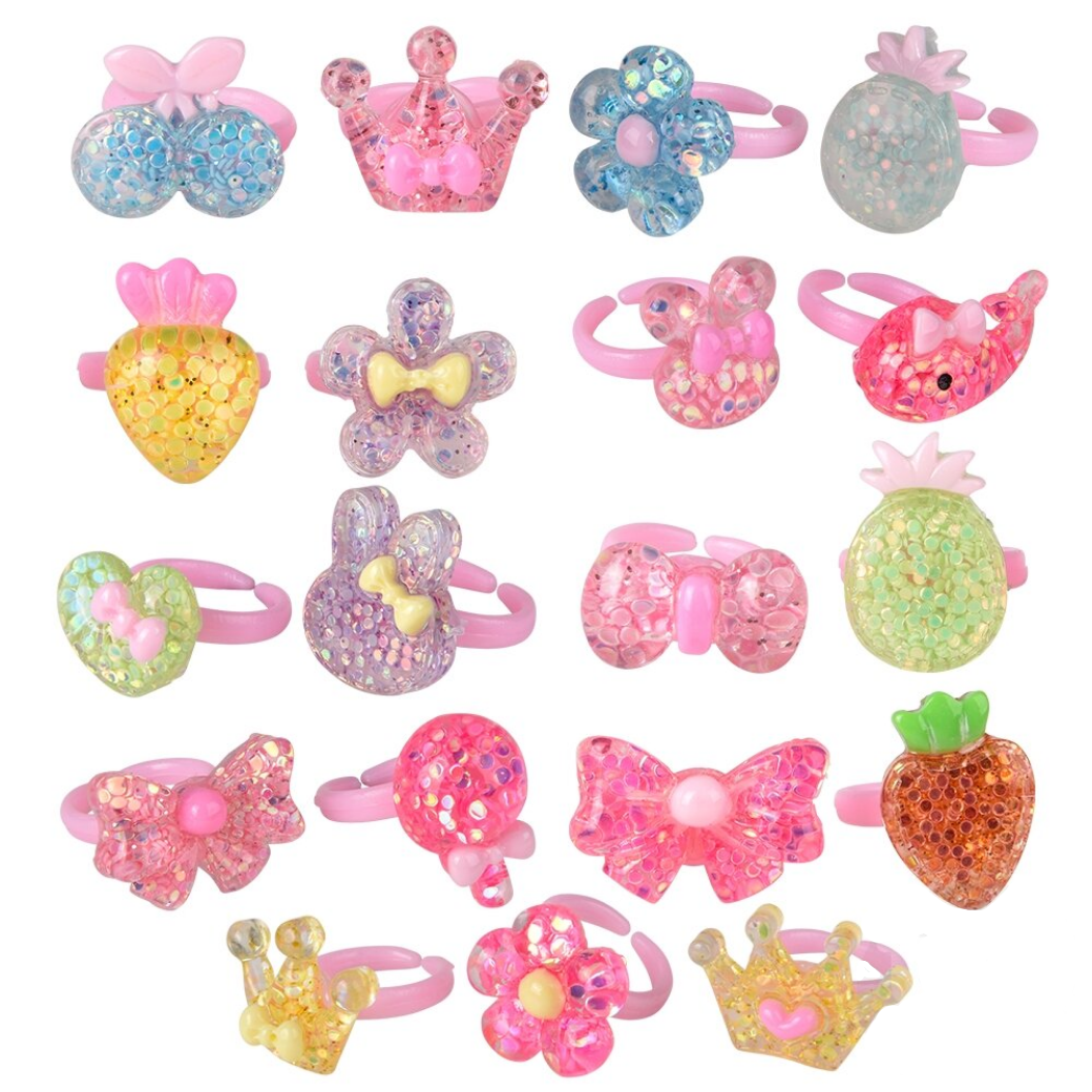 Assorted colorful children's hair accessories on a white background